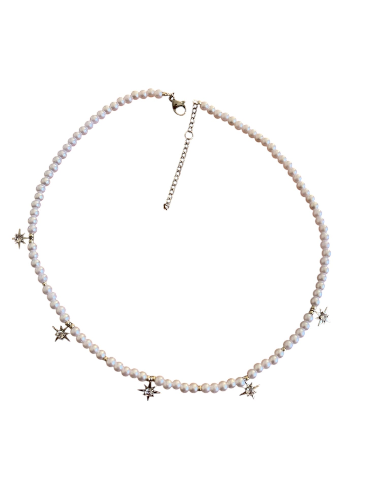 Collar de perlas y estrella